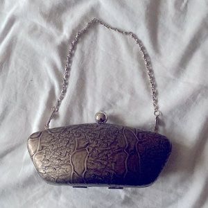 Retro style clutch hand bag. Solid material